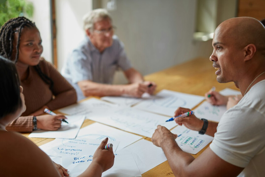 diverse group discussing ideas
