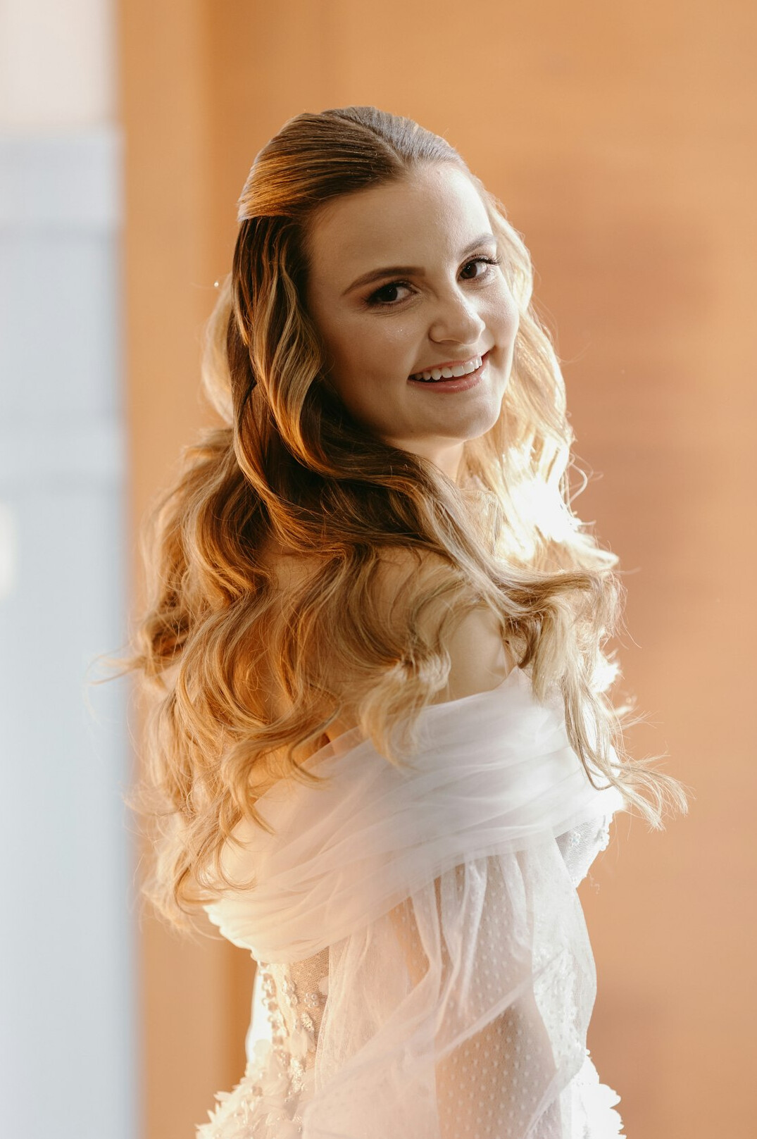 Portrait of a smiling woman with long hair
