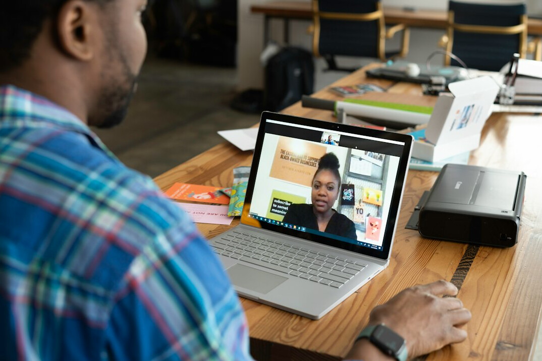 man taking online course