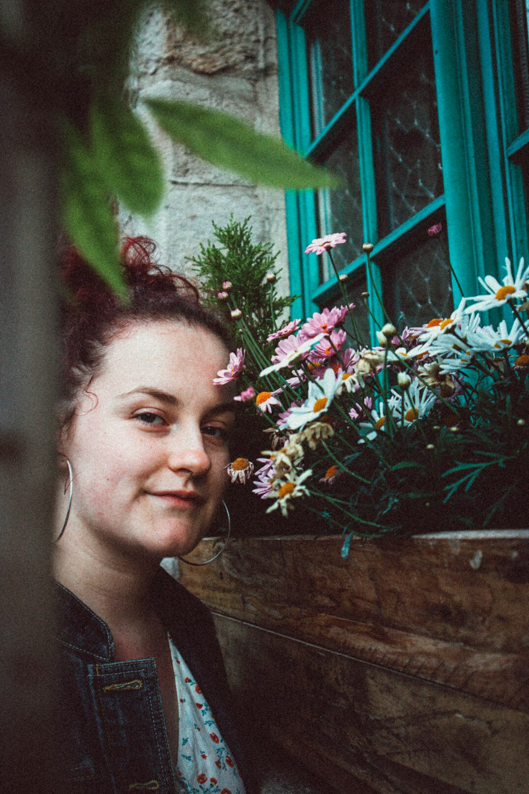 Portrait of a woman with brown hair smiling